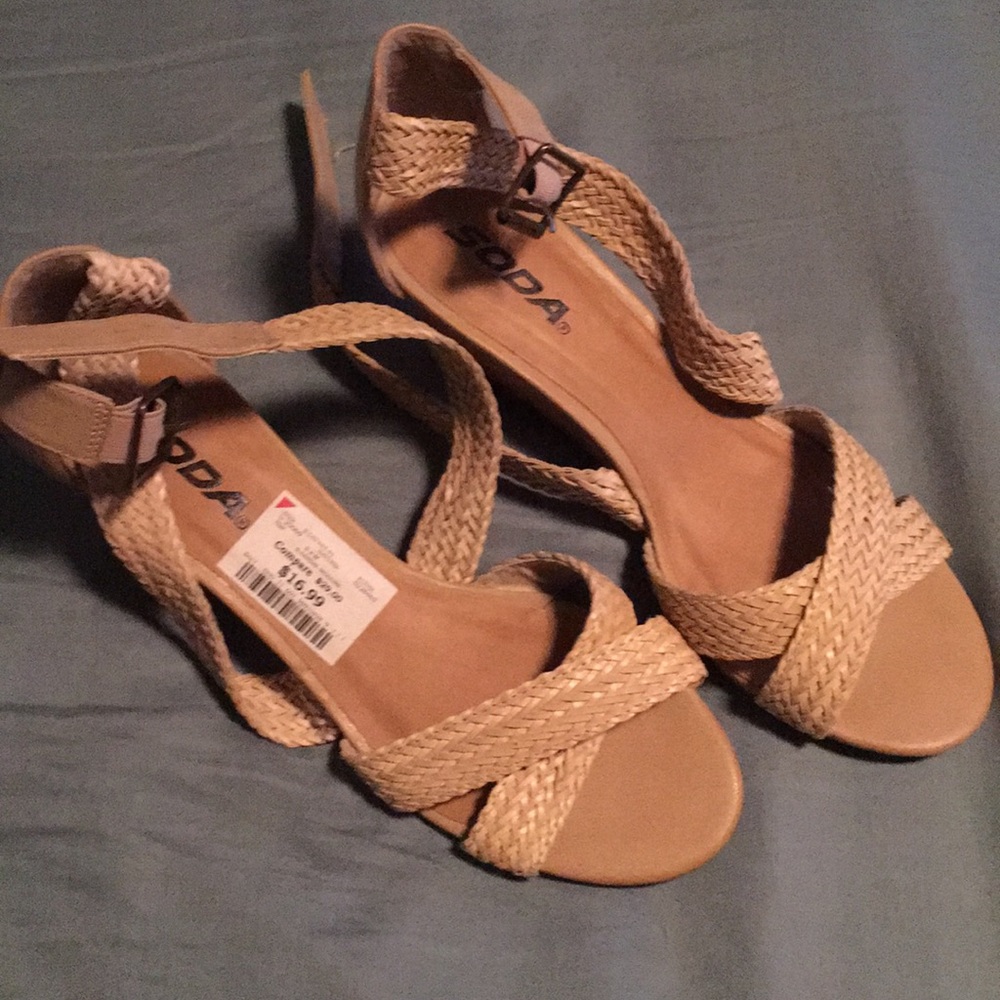 Never worn cute wedge style tan/beige shoes